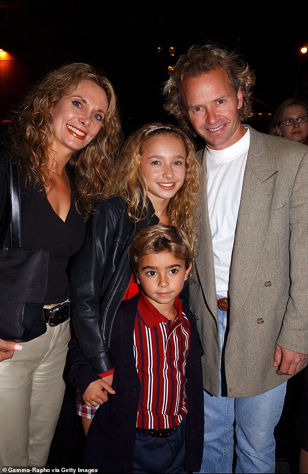 Hayden Panettiere is seen alongside her parents and brother in 2001
