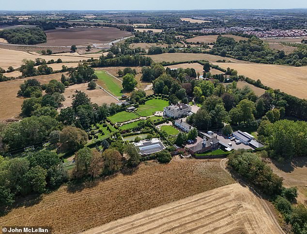 Sir Rod Stewart's Grade II-listed mansion has very green gardens despite the dry weather