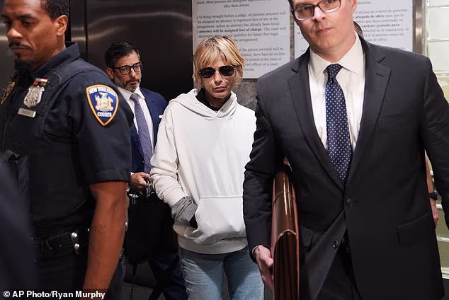 Blair allegedly punched one flight attendant and bit another, after trying to open the plane's door in the middle of the flight