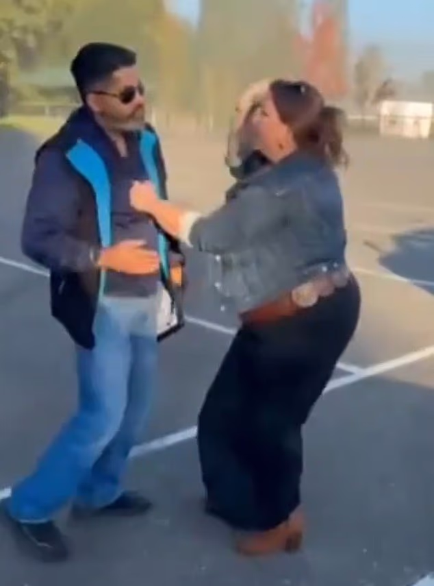 Woman arrested after she was filmed slapping driving instructor and hurling abuse at him in dispute over parking spot in nearly-empty lot