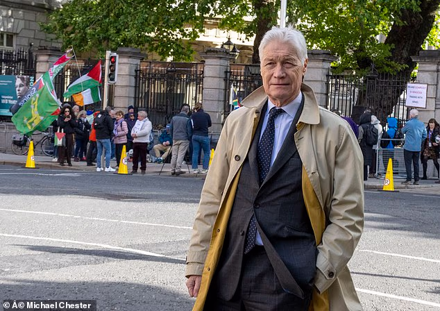 Richard Kay observes a protest outside the Dail, Ireland's parliament building, where there was a green 'Starry Plough' once the emblem of the murderous Irish National Liberation Army