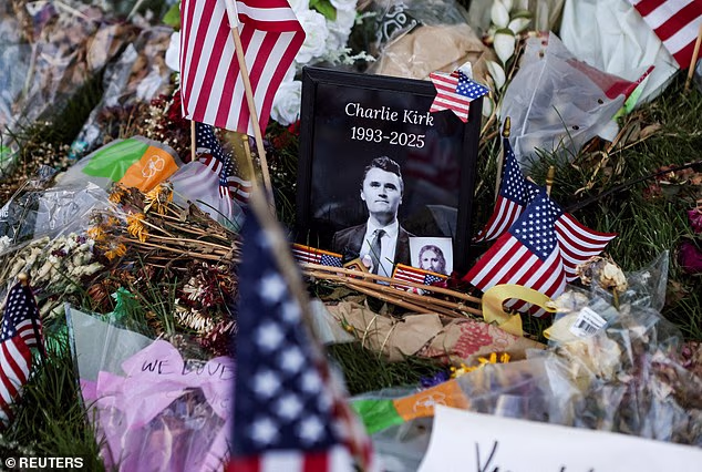 An image of slain conservative commentator Charlie Kirk is placed at a memorial in his honour, at Utah Valley University