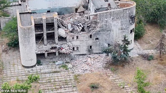 A drone video shows a destroyed building in Oleshky, Ukraine, a city that was captured by Russian forces on the first day of Russian President Vladimir Putin's invasion of Ukraine