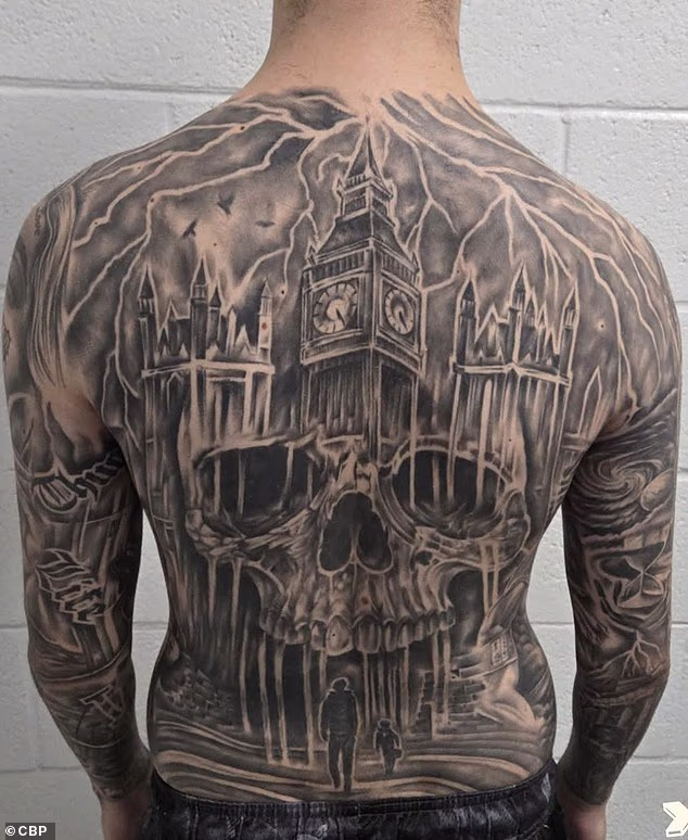 His tattoo expanded across his entire torso, including on his back and arms. The back of his left arm appeared to have the words 'thug life'