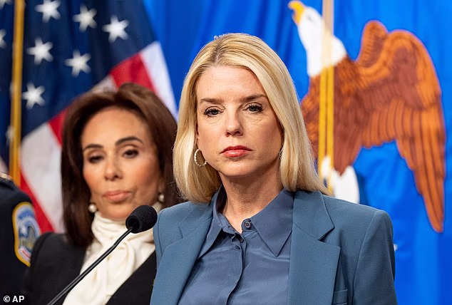 Then-Attorney General Pam Bondi is seen at a press conference with Pirro last year. Bondi disbanded the FITF in 2025, shortly after taking the helm of DOJ