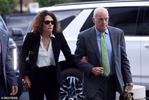 Charlie Kirk's parents, Robert W. Kirk and Kathryn Kirk, arrive for a court hearing of Tyler Robinson,