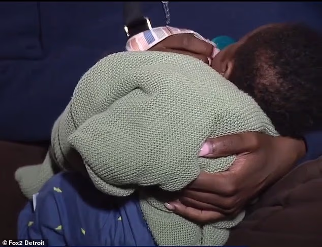 Four-week-old baby is beaten up by gang of Detroit women who lured his mother onto street so they could attack her