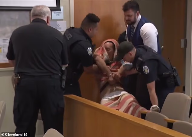 Asia Nguyen-Duy, 31, of Ashland, Oregon, was seen being carried into court with his pants down after he refused to walk himself