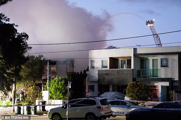 An investigation has commenced into the circumstances surrounding the incident and any links to a fire at a home two doors down. Pictured, smoke above Weddle Avenue on Tuesday