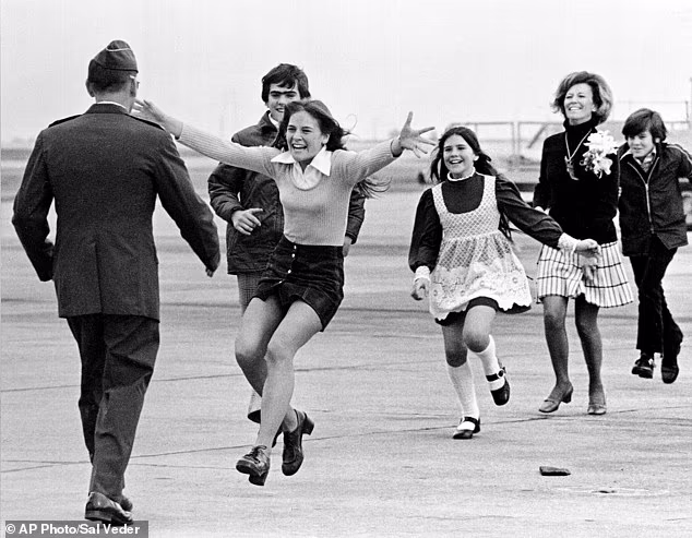 Woman immortalized in Pulitzer-winning Vietnam photo is stunned to receive POW bracelet after 53 years
