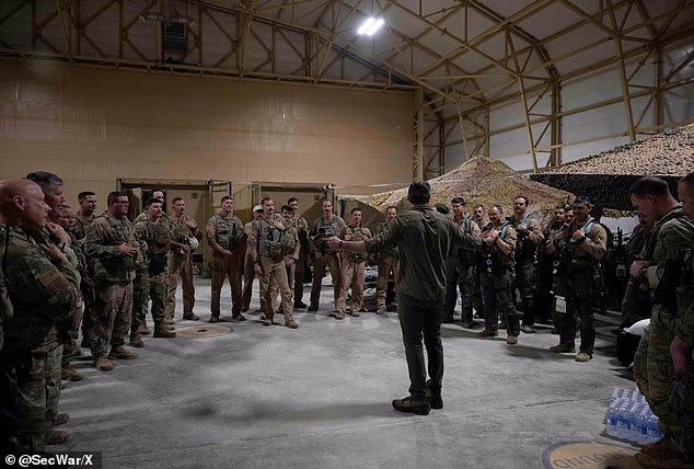 Hegseth is seen visiting the troops in the Middle East in May. Inside sources tell the Daily Mail they believe repeated leadership shake-ups have left troops uncertain about the future direction of the military (Source: SecWar/X account)