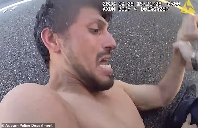 Bodycam footage from the officer sees Valles struggling with Bryant in the middle of the road