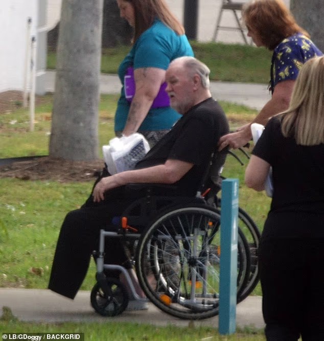 The 82-year-old, who denies all wrongdoing, was moved from the facility into a van waiting outside. He was then transported to a different center, where he will continue to receive treatment